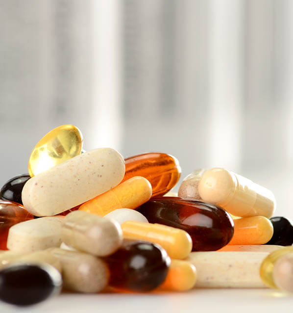 A pile of miscellaneous dietary supplements